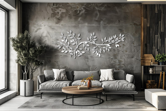 Featuring a reflective, almost-silver sheen, this leaf branch metal art for wall boasts a finish that enhances its minimalist botanical design.