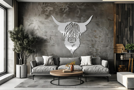 A muted, earthy mood is evoked by the decorative metal art of a highland cow head, a rustic farmhouse red bull decor piece.