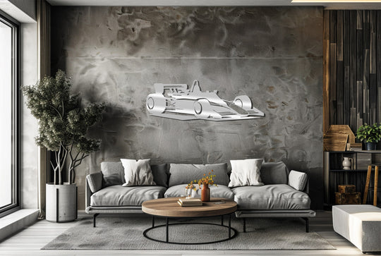 Striking color contrast highlights a silver Turbo Legend – Retro Formula Race Car metal art for wall against a textured gray backdrop, creating a visually dynamic focal point.
