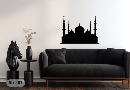 Painted white wall serves as a neutral background for the grand mosque silhouette metal artwork, enhancing the overall aesthetic with the metal artwork's dark contrast.