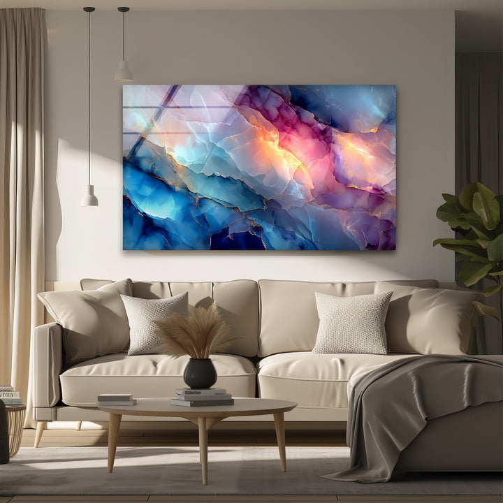 The brightest areas of this abstract marble glass wall art prints showcase radiant pink, orange, and blue hues with delicate golden veins.