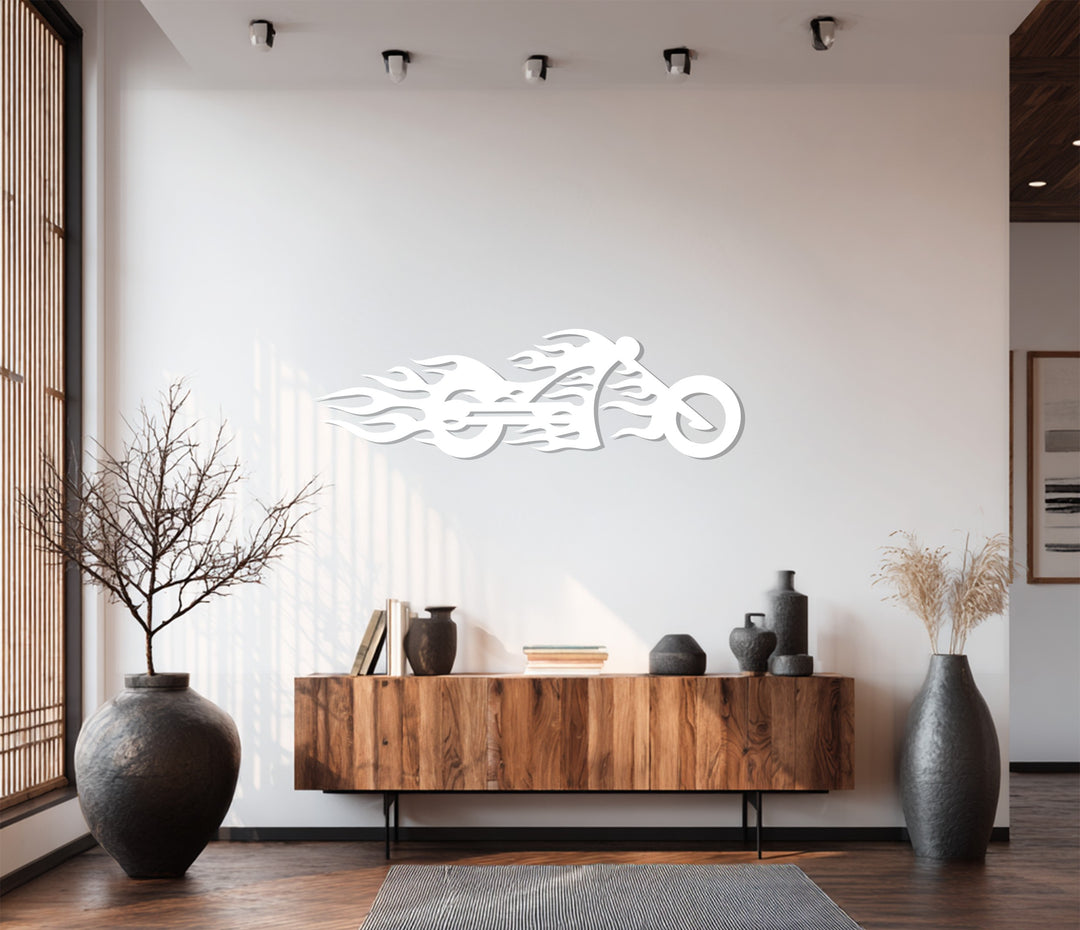 The light finish highlights the sleek, laser-cut details of this flaming motorcycle metal art for wall, a bold piece of speed-inspired decor.
