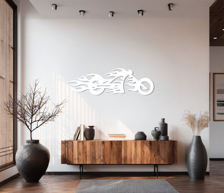 The light finish highlights the sleek, laser-cut details of this flaming motorcycle metal art for wall, a bold piece of speed-inspired decor.