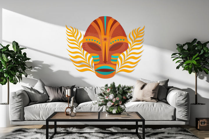 Ethnic-inspired metal wall decor featuring geometric tribal pattern