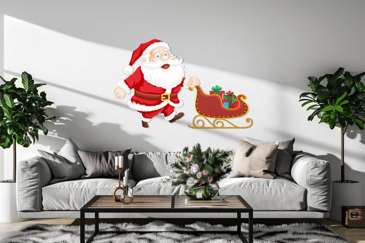 Holiday wall art featuring Santa with presents and sleigh