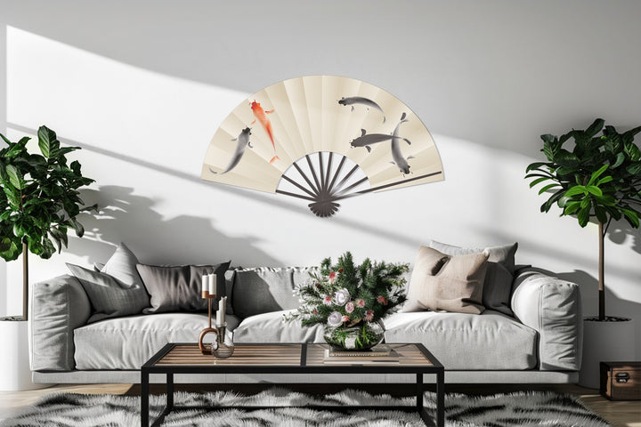 Displayed is unique metal wall art featuring an elegant koi fish fan in a Japanese-inspired design, adding a touch of cultural charm to your wall decor.