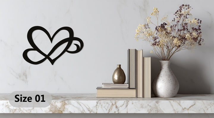 Modern black heart shaped metal artwork