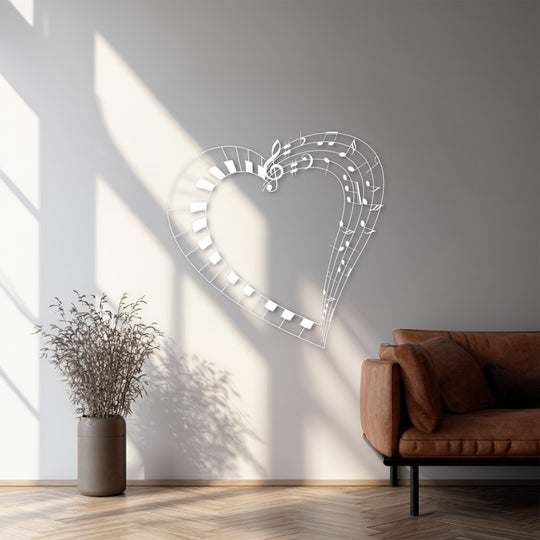 Shadowy areas accentuate the metal decoration wall art of a musical heart featuring piano keys and notes, creating a captivating focal point.