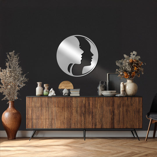 Depths emphasize the dual faces in circle metal art, with layered shadowing enhancing this unique metal wall art's abstract design and modern home decor vibe.