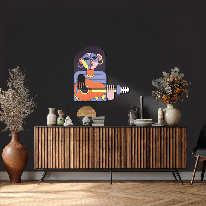 Modern art-inspired female guitarist wall sculpture