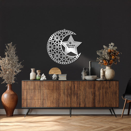 Beyond the Ramadan Kareem metal wall decor, the darkest area highlights the wall's textured, matte black surface, setting off the crescent star's silver finish.