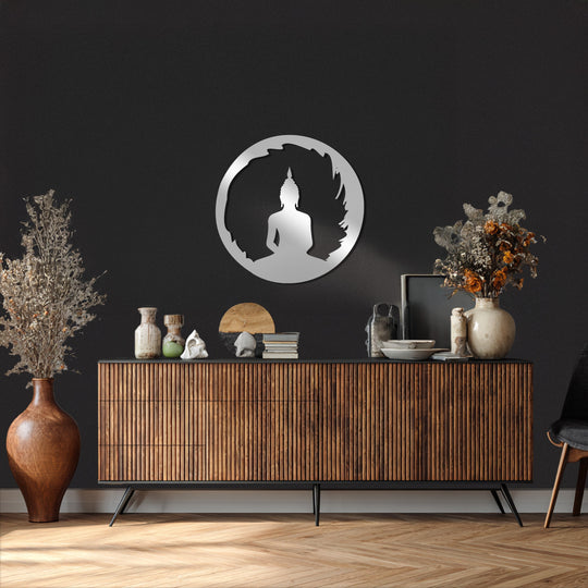 Highlighted by the bright silver, this decorative metal art features a round Buddha silhouette design that stands out boldly against the dark wall.