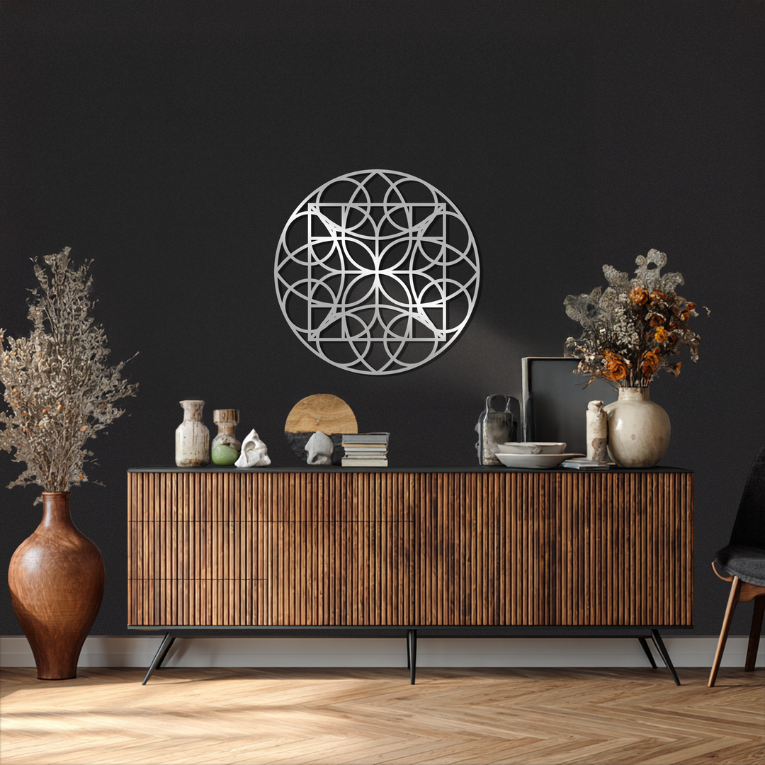 Centered on a dark textured wall, the decorative metal art showcases a geometric circle grid pattern in a round metal wall art design.