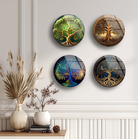 Subtle light illuminates the shadows within this set of round Tree of Life spiritual nature-inspired glass wall art decor, creating depth and visual interest.