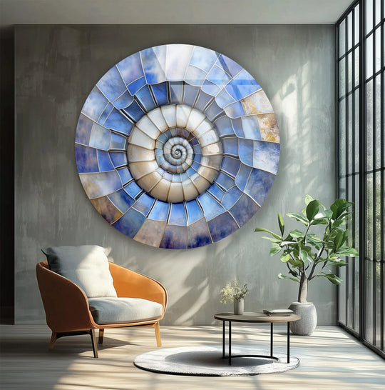 Displaying its abstract quality, the ocean spiral shell round glass wall art showcases captivating art from glass in concentric patterns of blue and sandy hues.