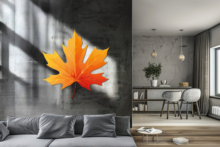 Revealing depth and layers, the golden autumn maple leaf metal art for wall is suspended against a textured backdrop, casting shadows that enhance its dimensional form.