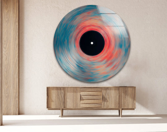 Striking vinyl-inspired abstract swirl round glass art creates a burst of color, making it a piece of unique modern wall decor that demands attention.