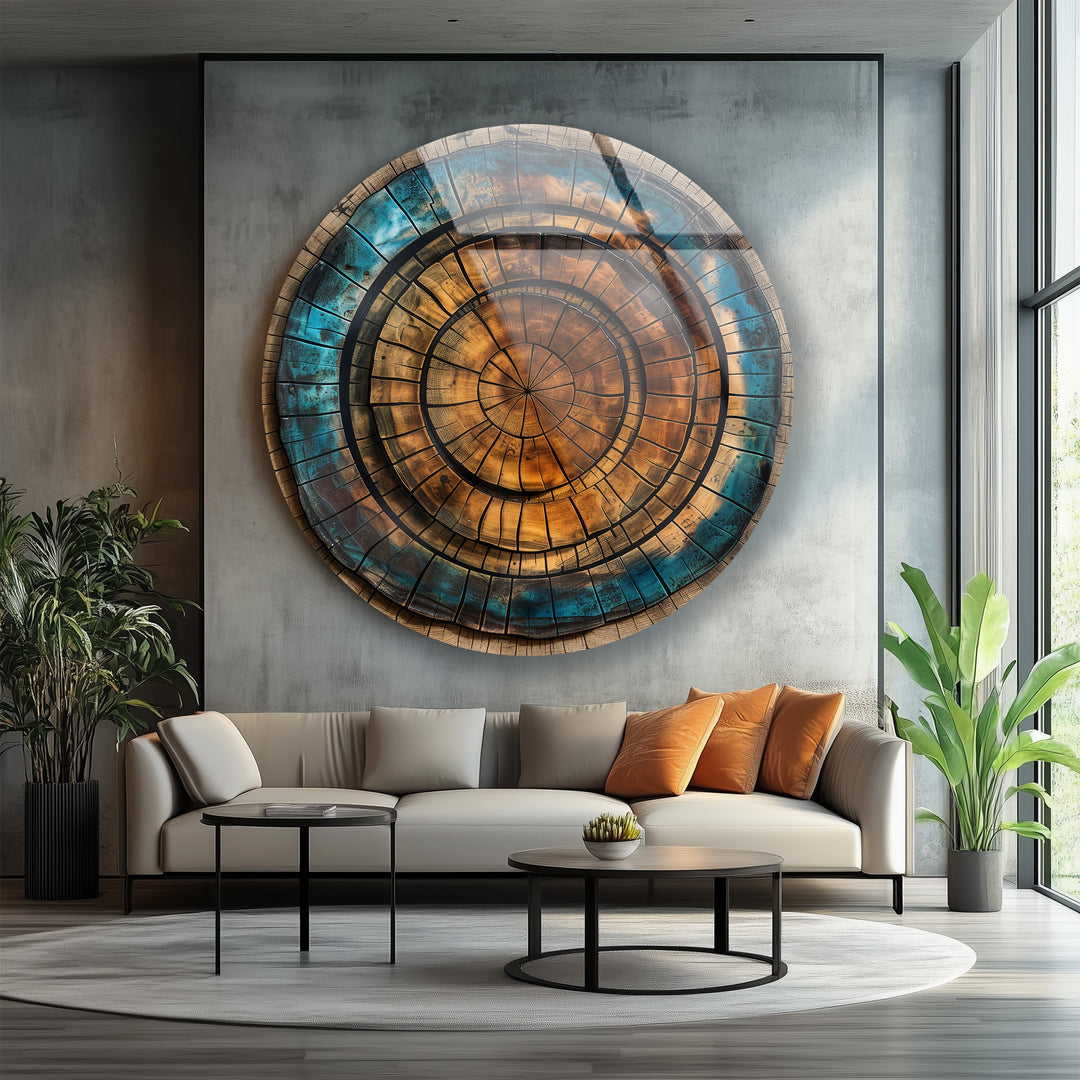 Nature-inspired glass wall art featuring concentric wood rings