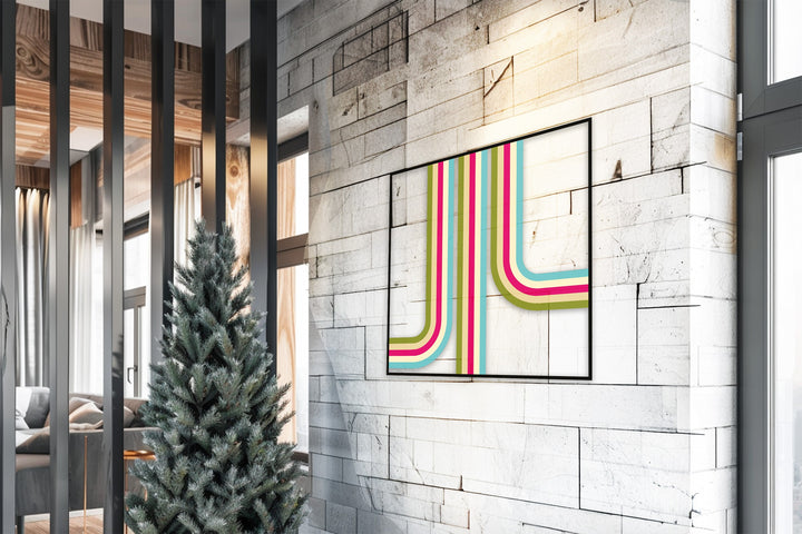 Mid-century inspired metal wall sculpture with bold stripe pattern