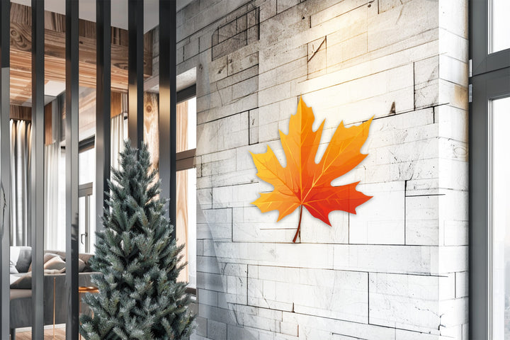 Defined by its striking metal wall decor, the Golden Autumn Maple Leaf metal wall art features clean borders that accentuate its modern fall design.