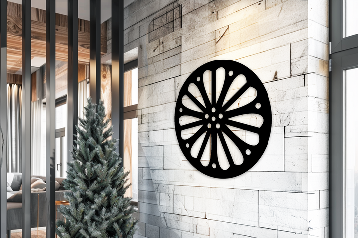 Cool tones highlight the radiating petal pattern of this black metal artwork, adding a touch of modern metal artwork to the decor.