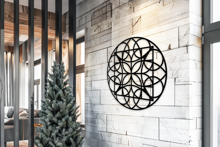 Bold decorative metal art defines this Geometric Circle Grid Round Black Metal Wall Art, the loudest element on the neutral brick wall.