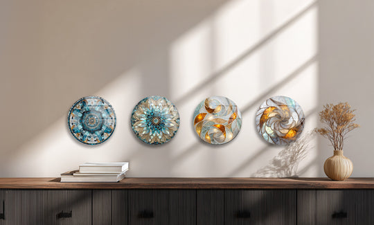 Round set glass wall art shows an abstract mosaic design in gold and blue tones and it is decorative glass art in a wall art set.