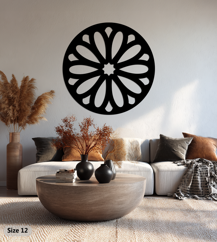 Highlighting the layering effect, this floral burst round black metal wall art showcases unique metal wall art with intricate detailing, casting interesting shadows and dimension on the wall.