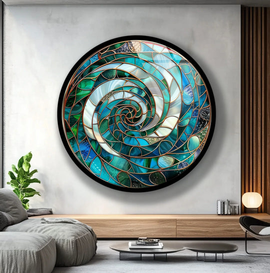 Crafted with premium art glass, the Aqua Spiral Harmony round wall art adds a stunning piece of home decoration featuring swirling shades of turquoise and teal.