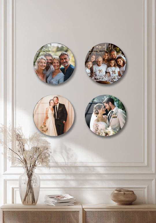 The round glass wall art features family and wedding photos and is glossy and vibrant and is custom family photo glass art and personalized and celebrates timeless moments on a white wall