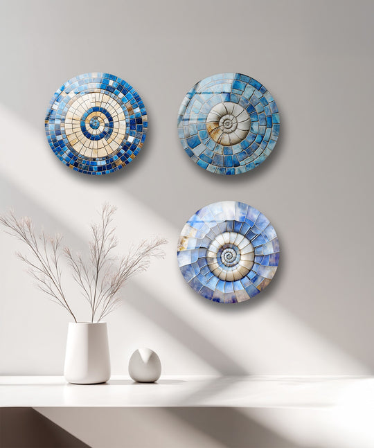 The round mosaic glass wall art set has azure blue spirals and a glossy finish and it is elegant ocean inspired decor for modern wall art designs