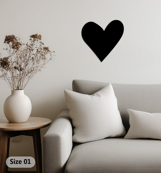 With a smooth, matte finish, this black heart decorative metal art adds a modern, love-inspired touch to minimalist home decor.