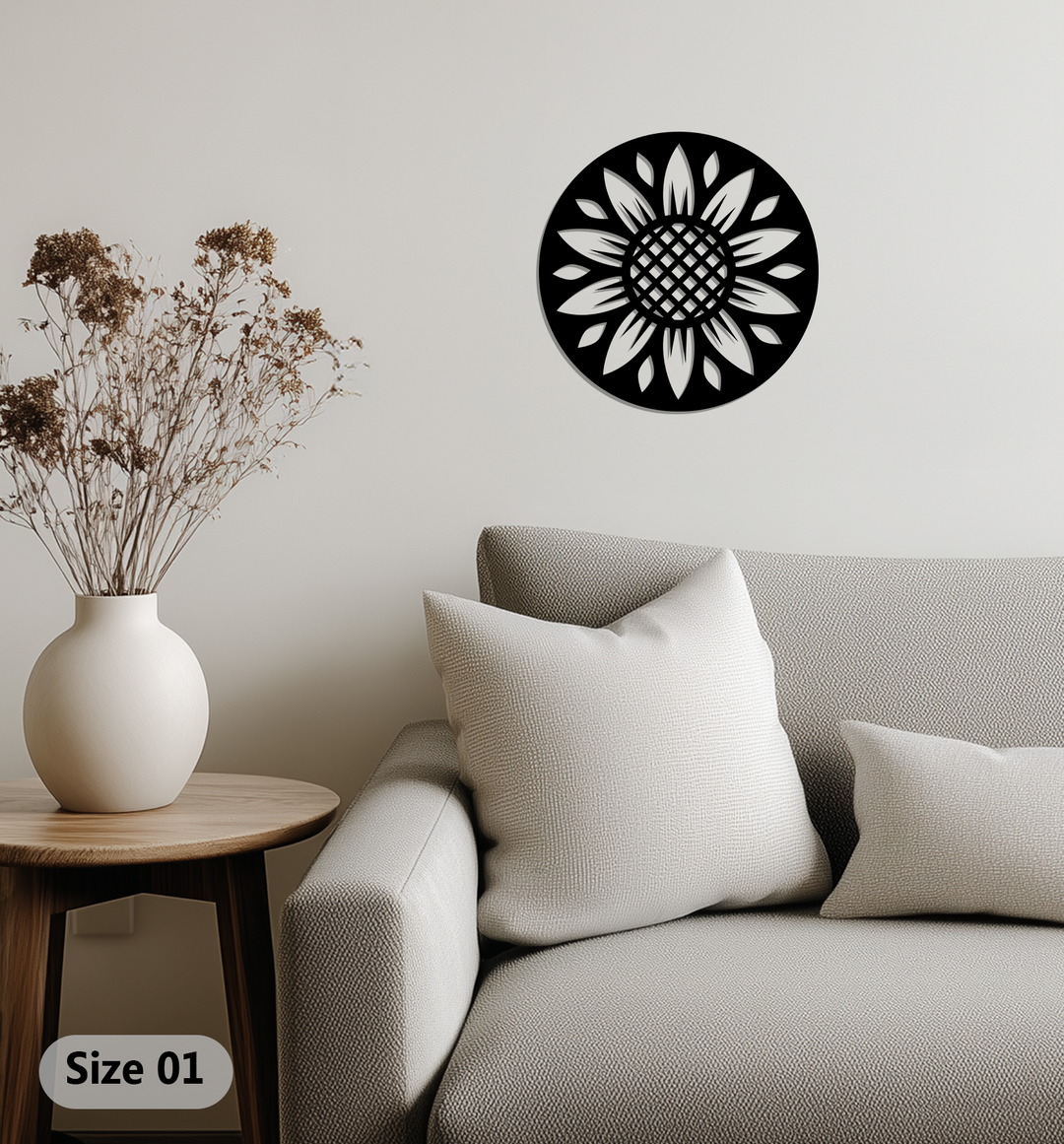 Black is the dominant color of this round metal decoration wall art featuring a cut-out sunflower pattern.