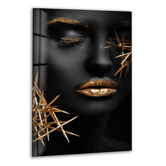 Luxurious gold lips and eyes on a black woman adorn this high-quality glass art, offering a striking, modern aesthetic.