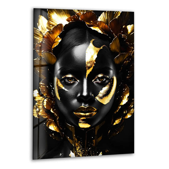 A close-up on the lustrous texture of a black woman's face adorned with shimmering gold accents on this striking wall art print.