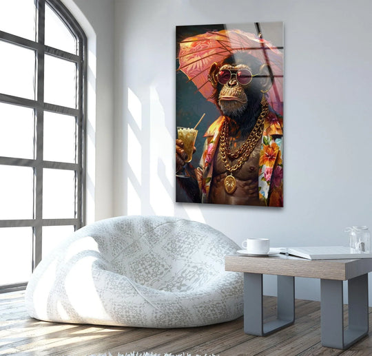 A stylish monkey holding a drink and umbrella in tempered glass wall art features vivid floral patterns against a muted background for striking color contrast.