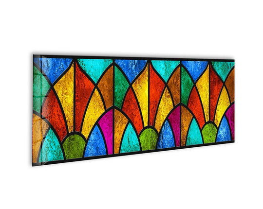 Framed by its darkest, leading lines, this abstract stained glass wall artwork features a colorful mosaic of jewel-toned segments creating a stunning panoramic.