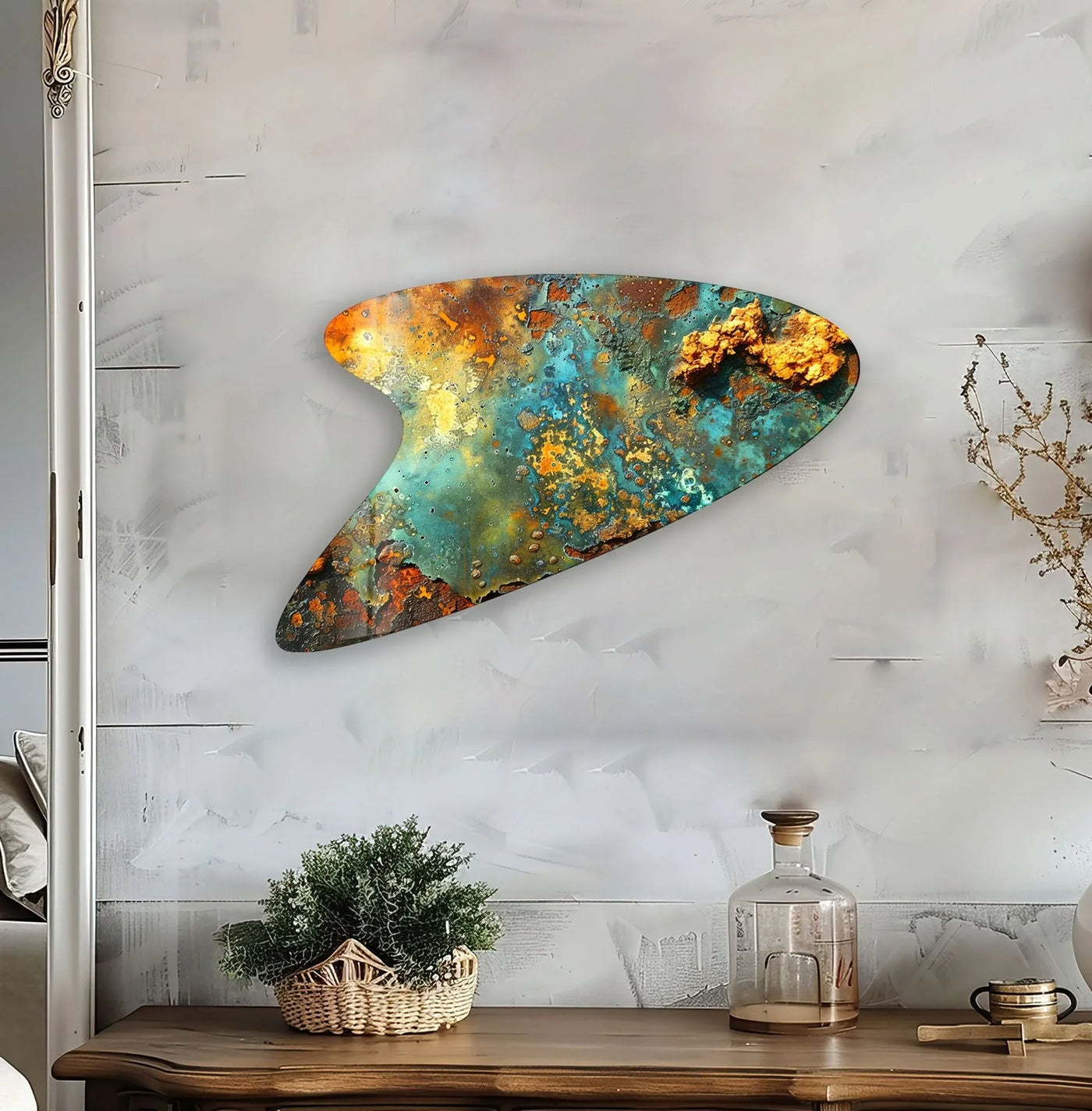 Irregularly shaped art from glass showcases organic forms with swirling textures of teal, rust, and gold.
