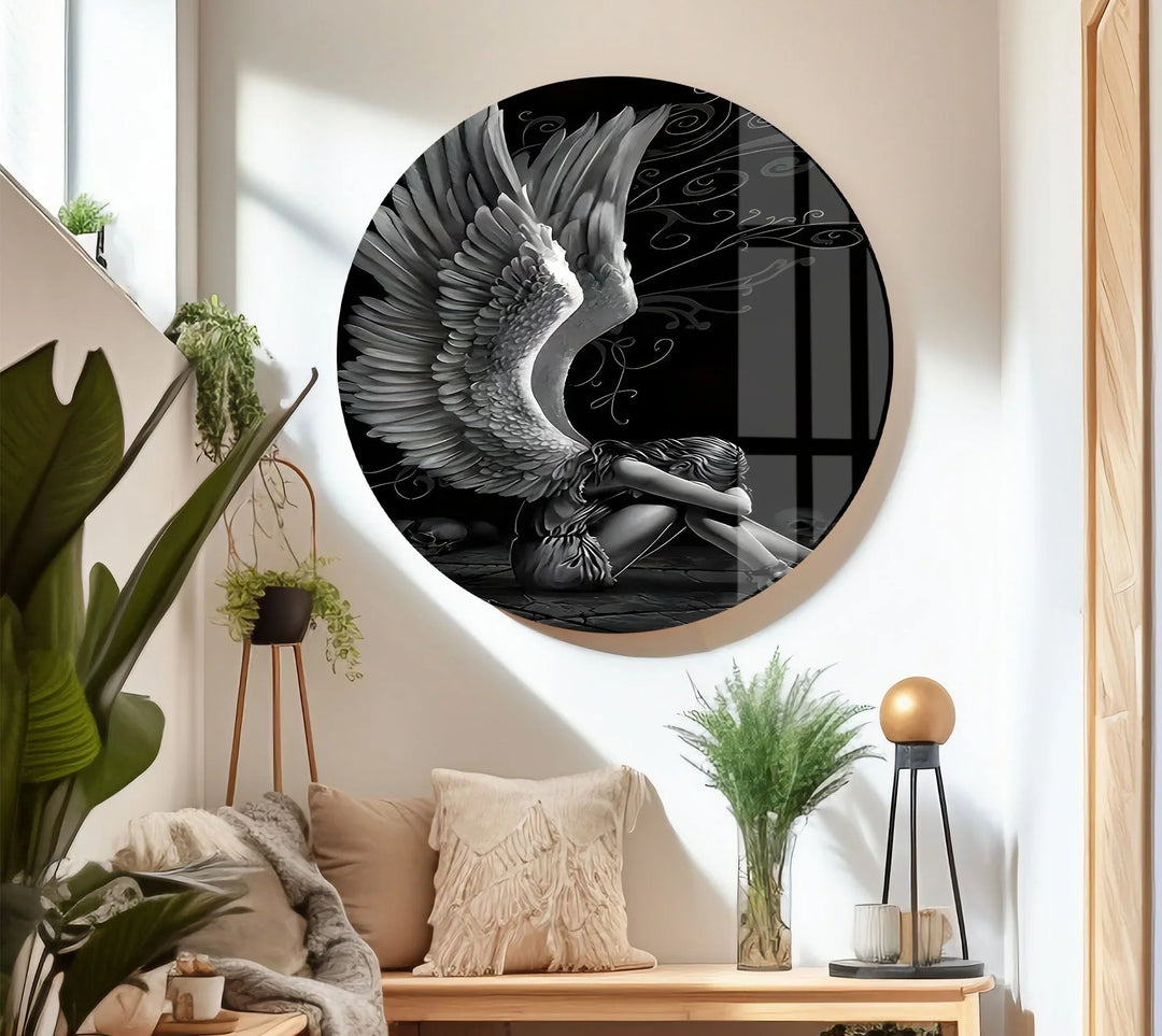 Emotional black and white angel artwork printed on glass featuring a winged figure resting on the ground.