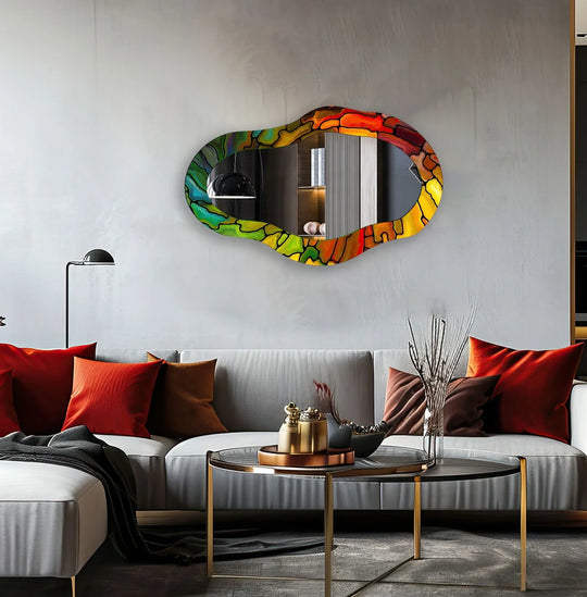 Asymmetric wall mirror displaying an abstract design and vibrant colors on its tempered glass frame reflecting a modern living room and artistic decor