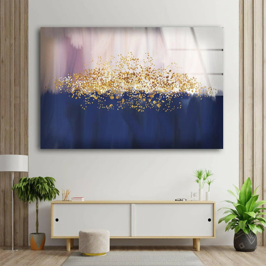 Vibrant abstract glass wall art features a rich navy blue base contrasting with a bright, highly saturated display of golden speckles and soft lavender hues.