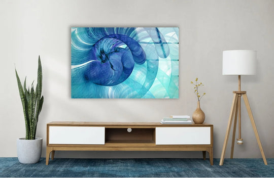 Abstract blue circles glass print wall art featuring swirling light and shadow patterns on a textured background.