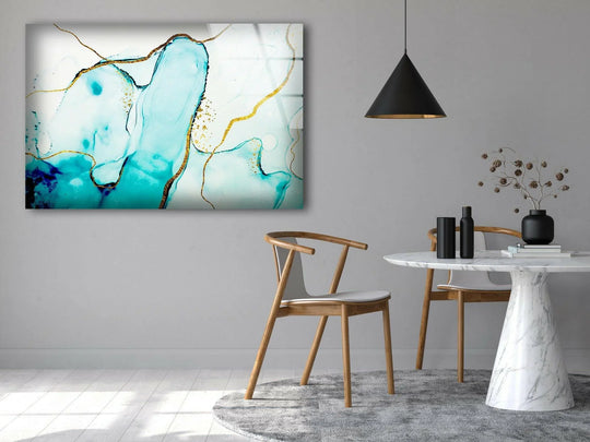 The abstract blue marble glass wall art with striking gold veining commands attention as decorative wall art.