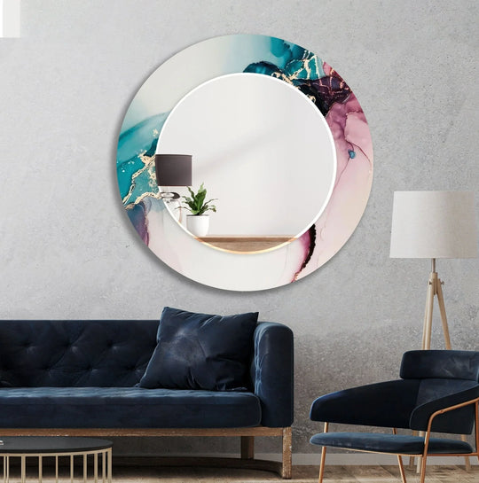 The round mirror shows an abstract blue and pink design and is a stylish round mirror for modern wall decor and bedroom wall accents