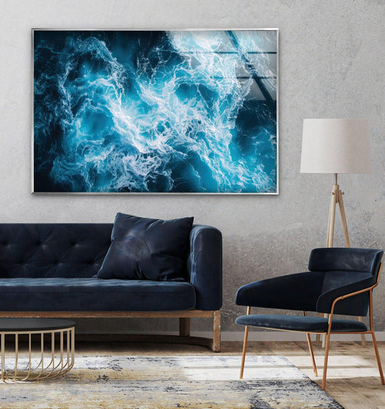 Abstract blue water splash glass wall art showcasing a vibrant, glossy finish.
