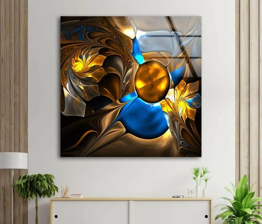 Modern abstract blue and gold fractal patterns on glass printing hang above a white credenza with plants.