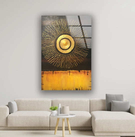 Golden abstract circle glass art with yellow and brown tones.