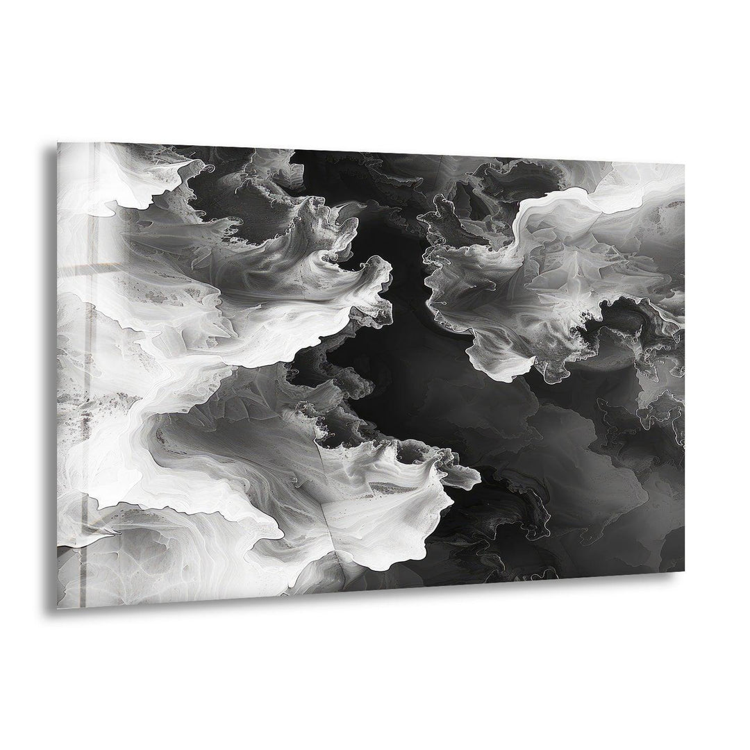 Monochrome abstract glass art showing flowing smoke-like shapes merging into dark and light gradients.