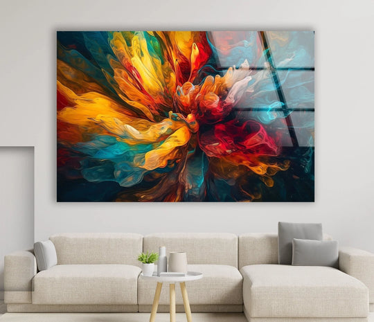 Vibrant abstract colorful liquid art from glass explodes with fiery reds, bright yellows, and cool blues in a mesmerizing central display.