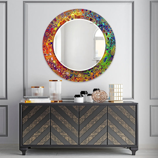 The round mirror features abstract colorful swirls and is a decorative round mirror and a vibrant wall mirror and modern wall decor for home on a wall